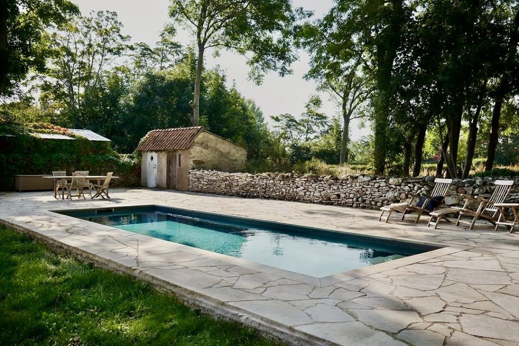 3. Stone Pool With Old-World Charm