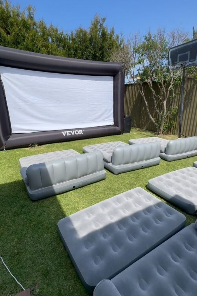4. Get Ready to Relax: Backyard Movie Night with Inflatable Seating