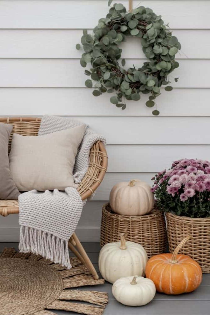 4. Pumpkins Paired with Greenery