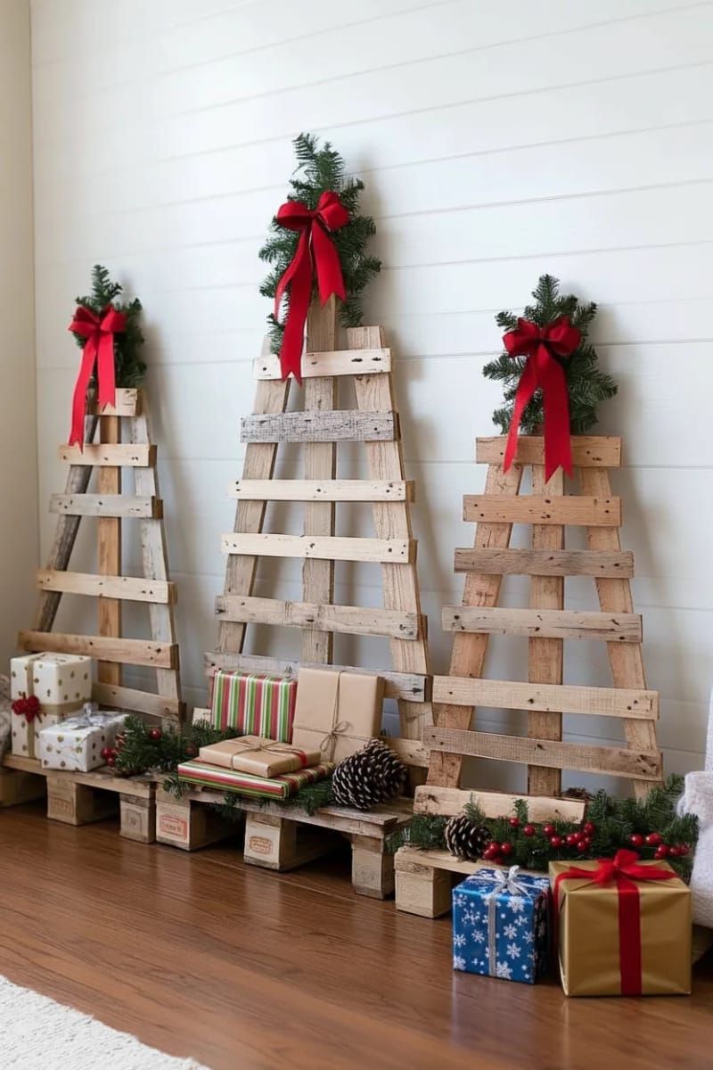 20. Reclaimed pallet tree trio with ribbons and holly
