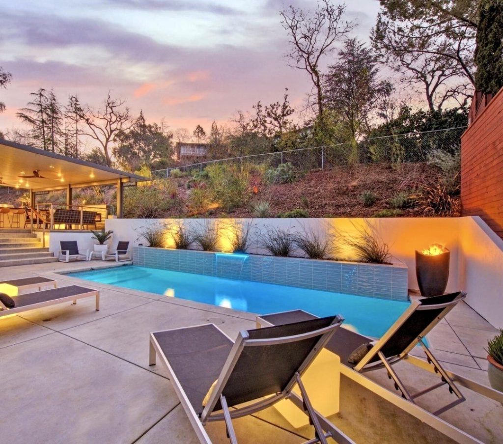 18. Soft Lighting for a Cozy Pool