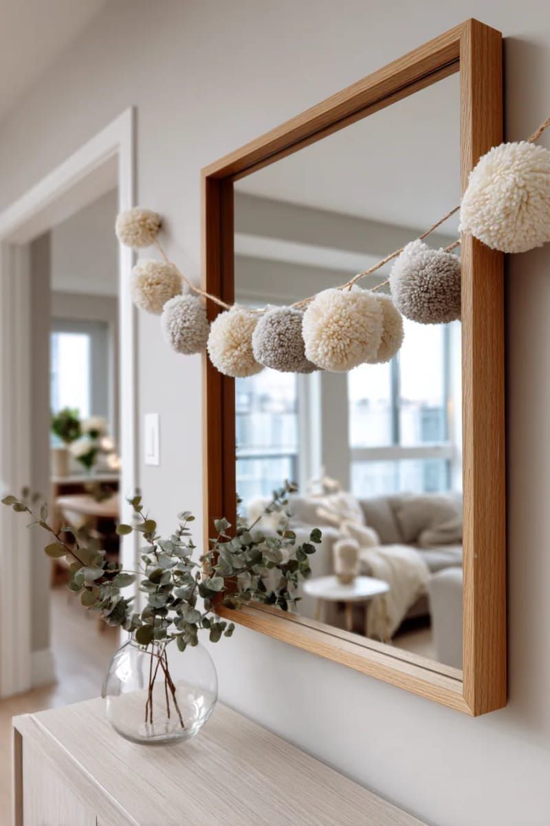 26. Neutral Pompom Garland on a Mirror - photo 2