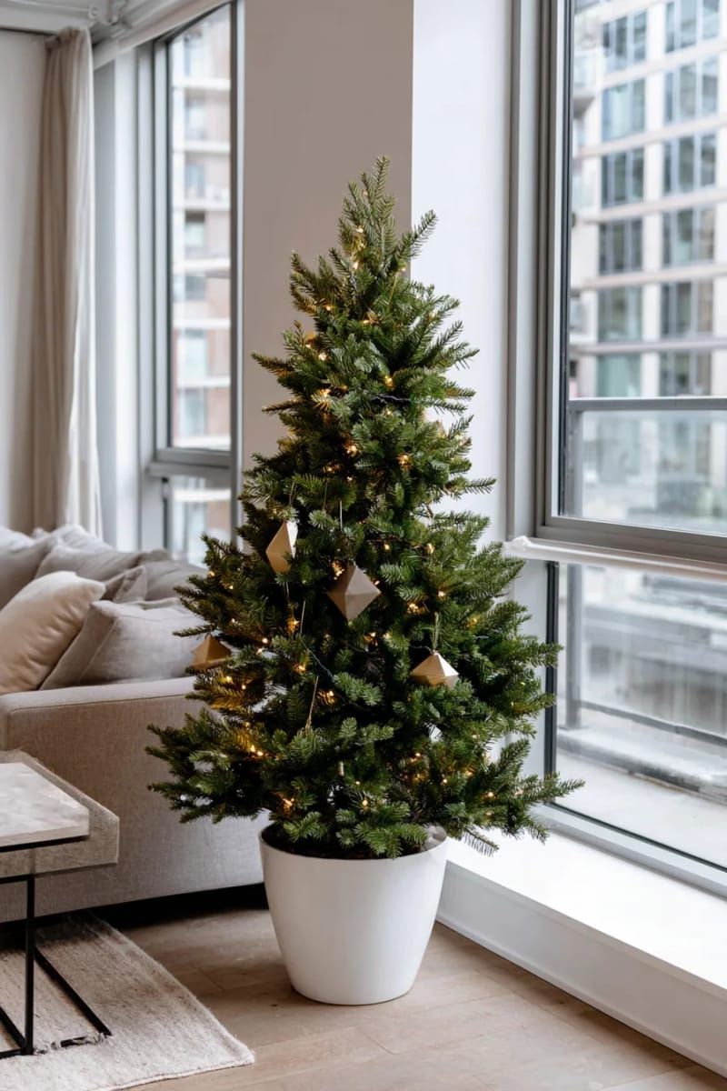 18. Minimalist tree with white lights and geometric shapes
