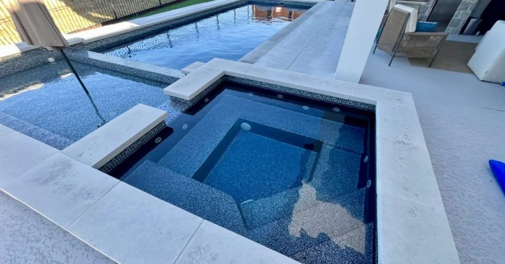 24. A Patio Pool With Spa Access