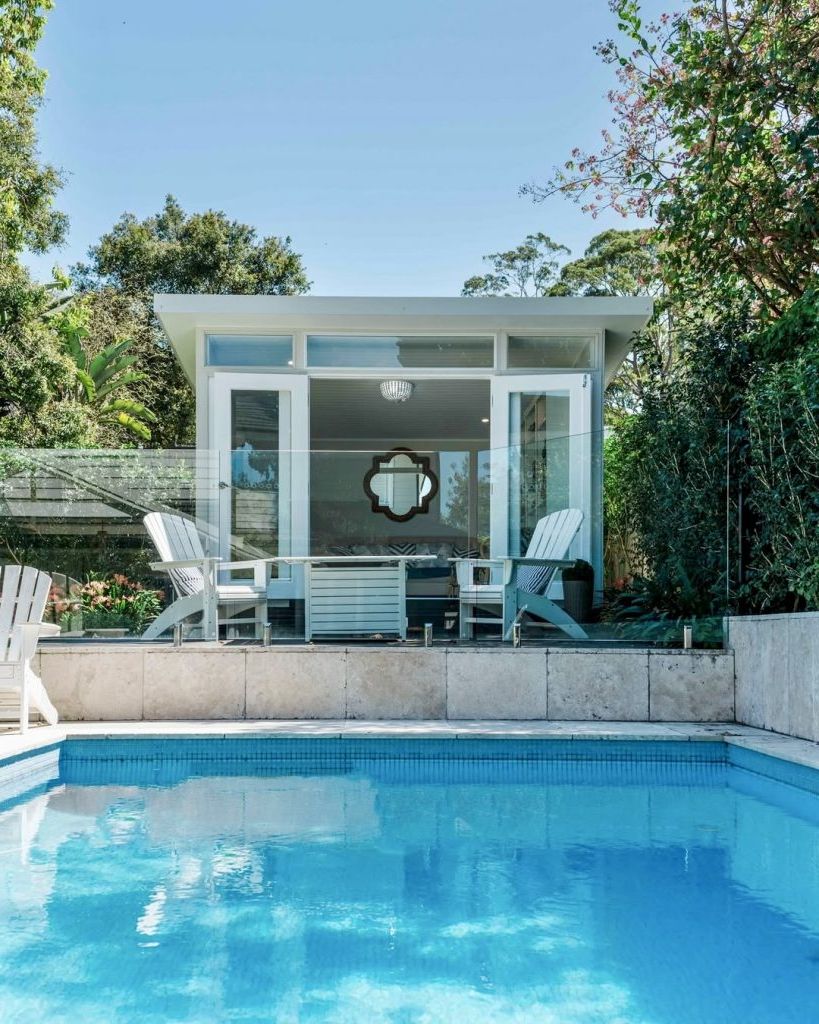 13. Glass-Fenced Elevated Pool Lounge