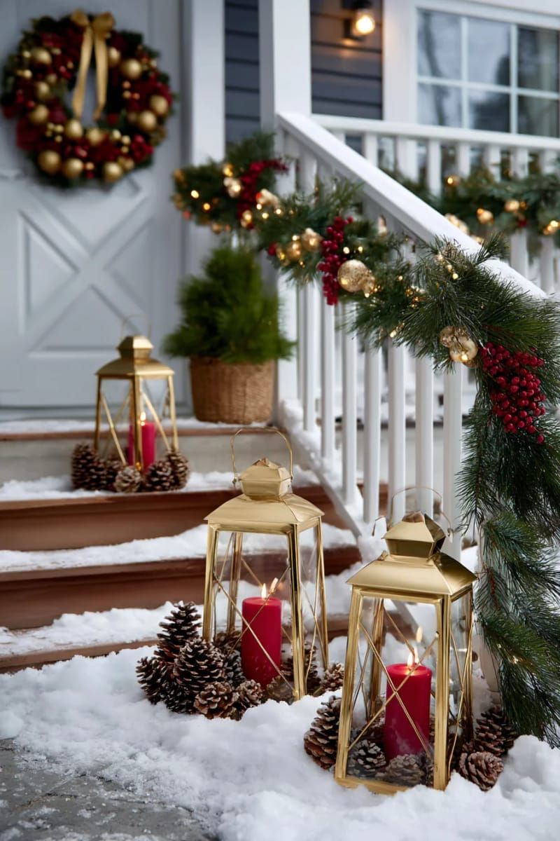2. Gold Lanterns With Red Candles On Snowy Steps