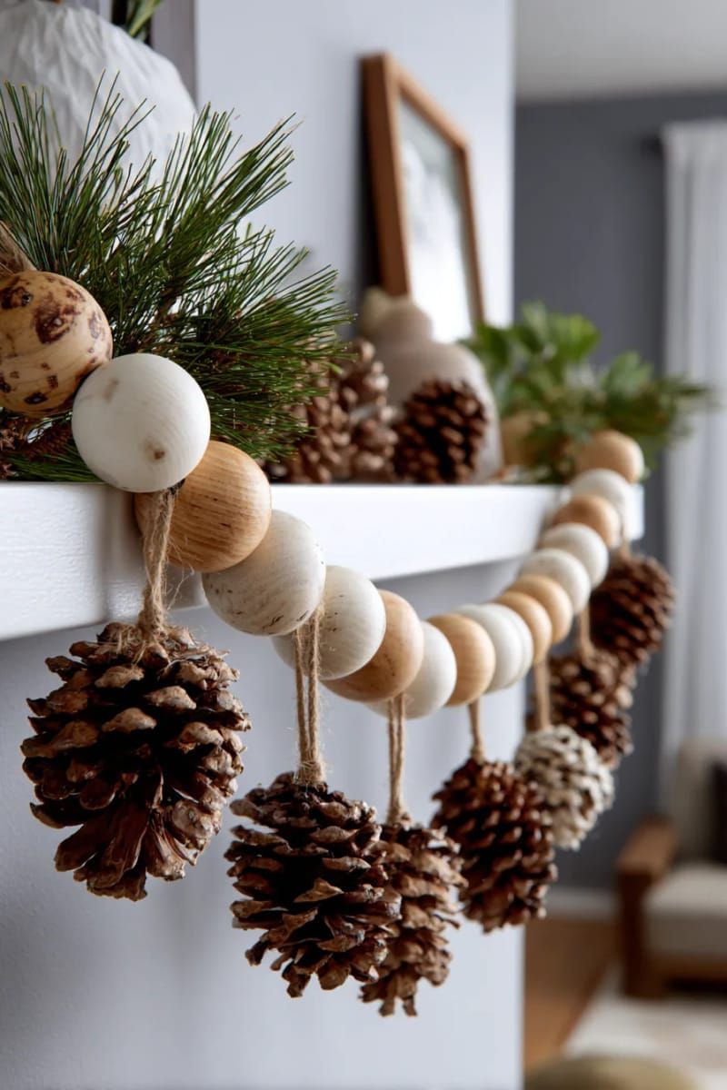 11. Scandinavian-inspired garland of wooden beads and pinecones on the wall