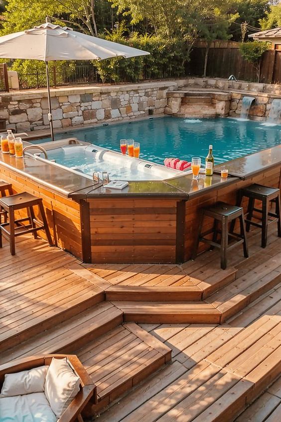 29. Enjoy drinks by the pool at our elevated bar seating area.