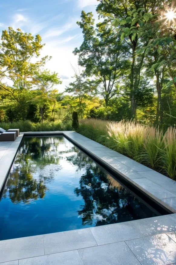 Sleek Minimalist Pool With Lush Landscaping