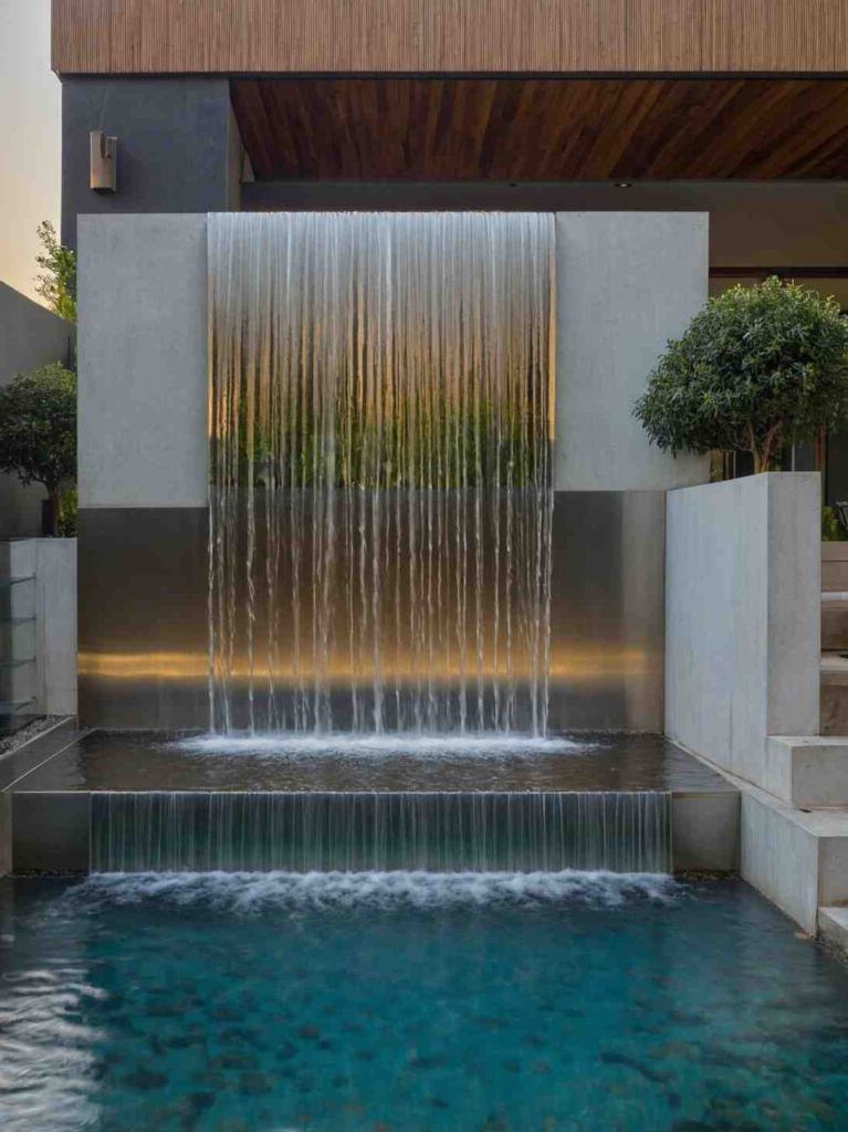 2025’s Top 47 Backyard Pool Ideas: Waterfall Wonders - photo 31