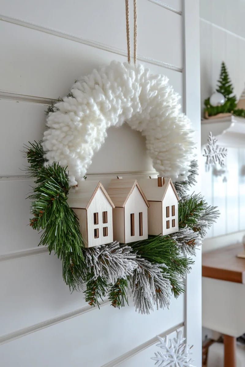 6. White Pom-Pom Wreath With Wooden Houses - photo 3
