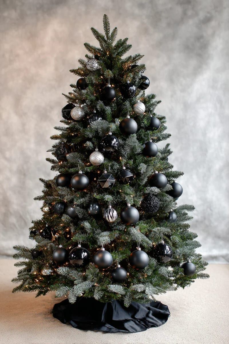 16. All-Black Christmas Tree With Matte Ornaments