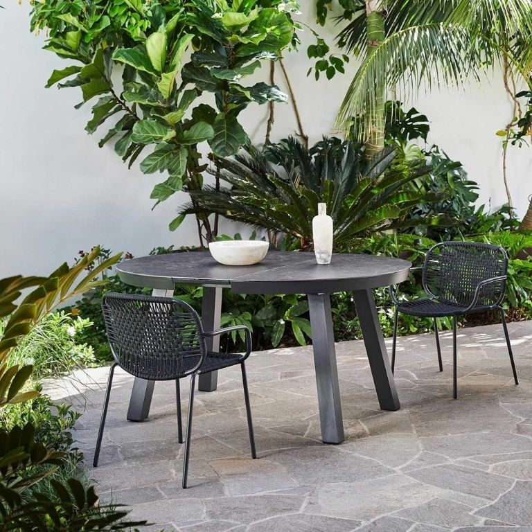 2. Create a Tucked-Away Dining Nook with Lush Greenery