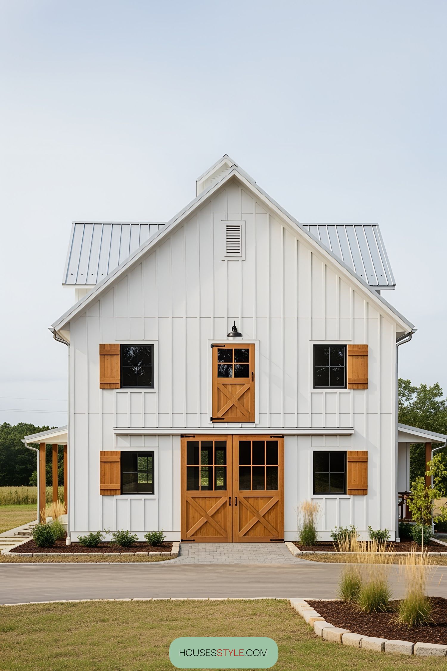 8. Barn Chic: Elegant White Exterior Design