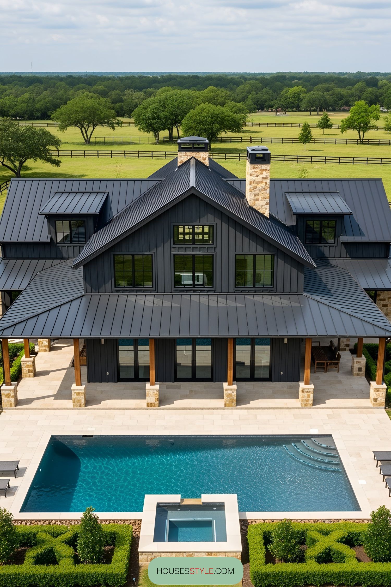 A Barndominium Oasis with a Wraparound Porch and Pool