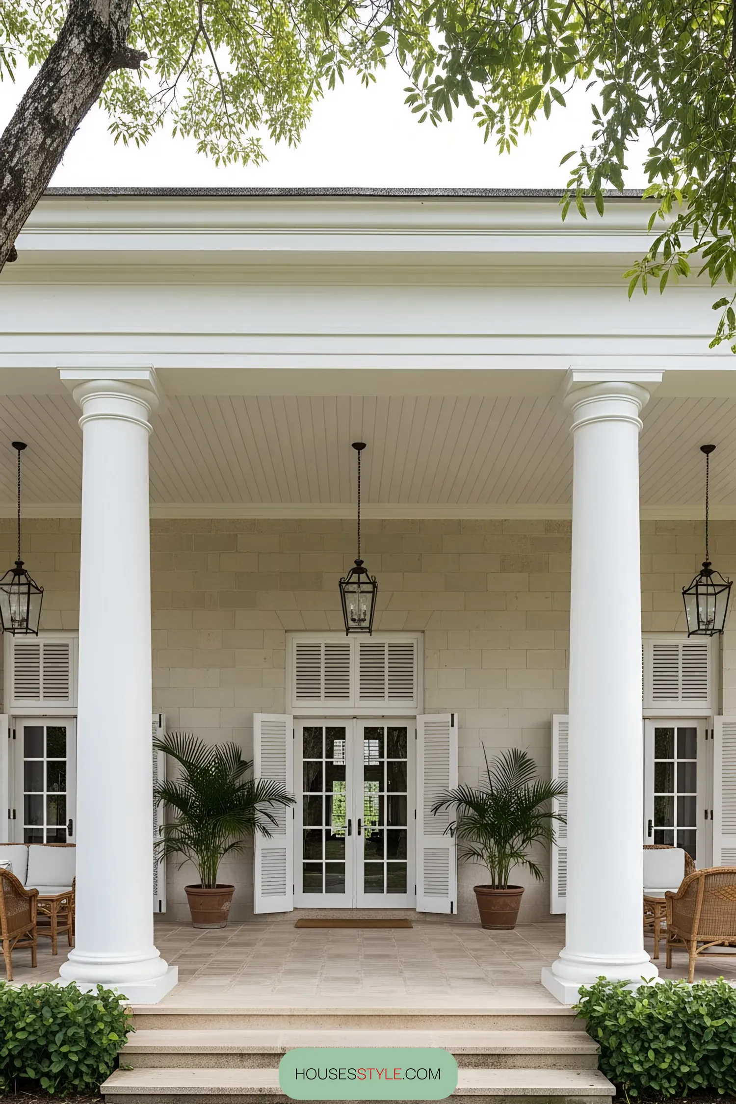 A Colonial Porch Shaded by Tropical Trees