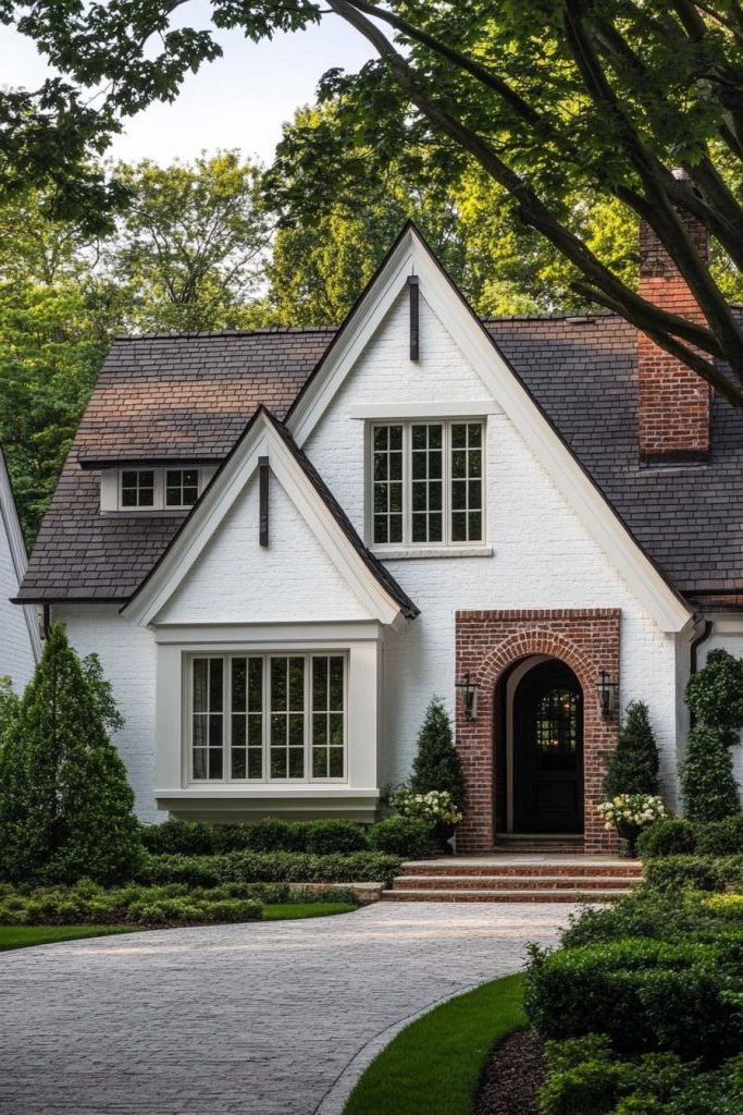 Wood Shingles Paired With Brick Accents