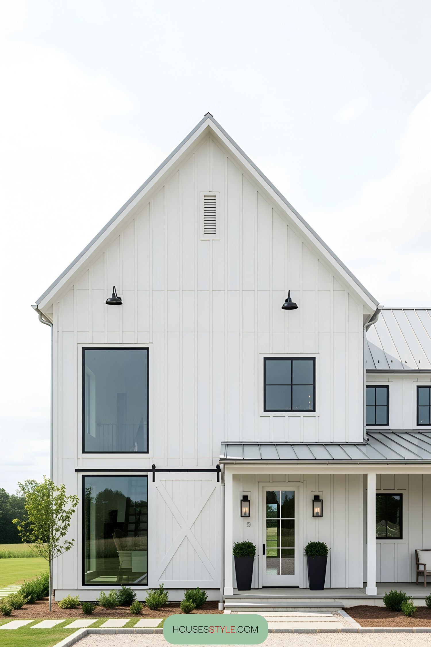 2. Charming White Barn Retreat with Chic Style