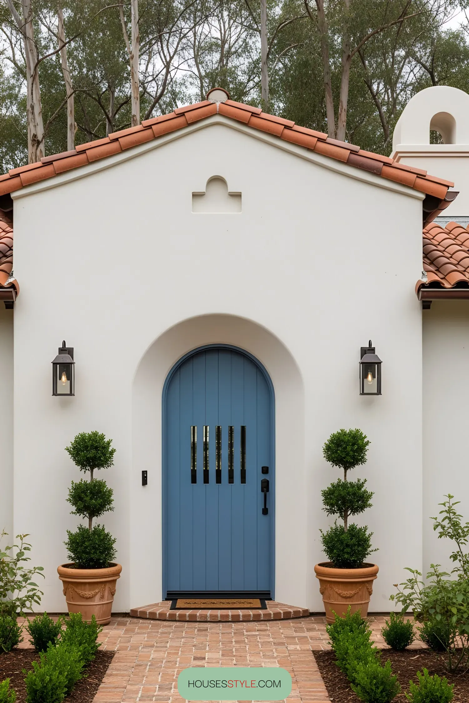 A Coastal Facade With a Bold Blue Door