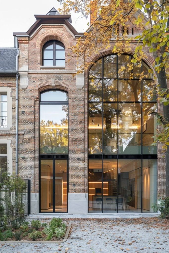 Open-Plan Glasshouse Inside A Historic Shell