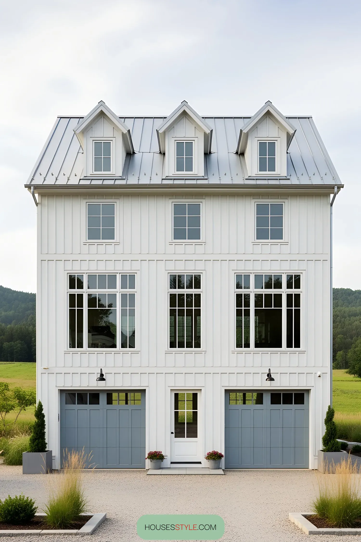 Grand Farmhouse With Bold Garage Entrances