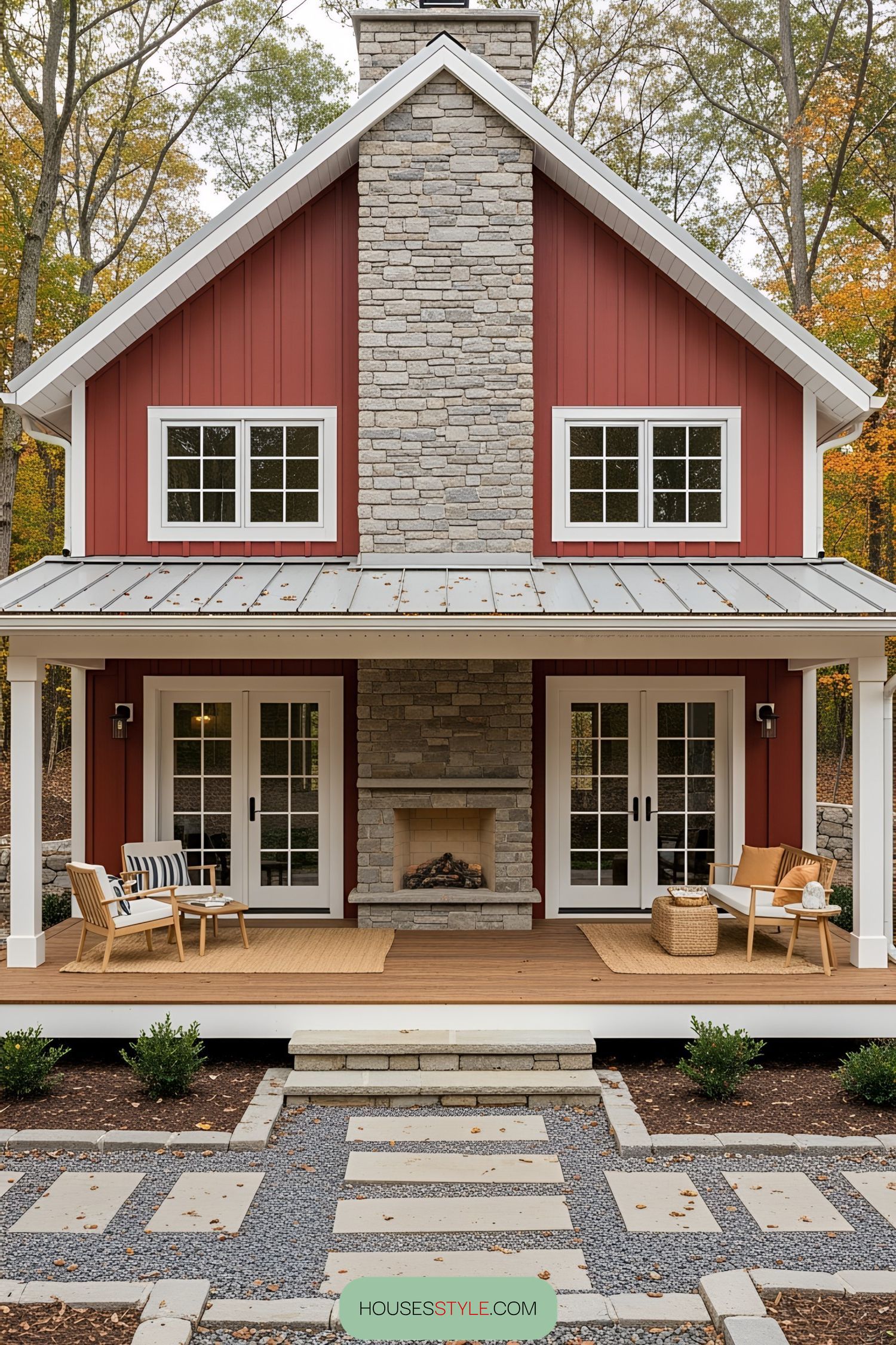 A Quaint Red Cabin with a Rustic Stone Fireplace