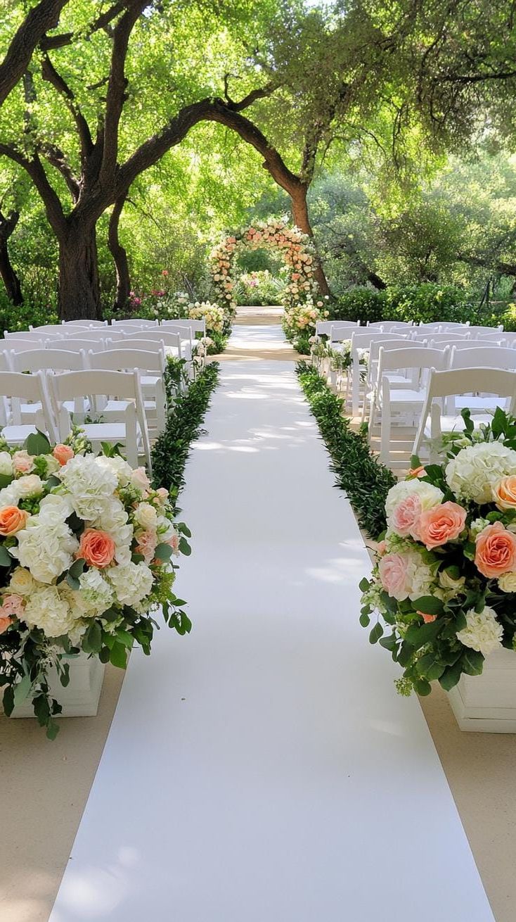 14. Flower-Bordered Ceremony Aisle With Greenery - photo 2