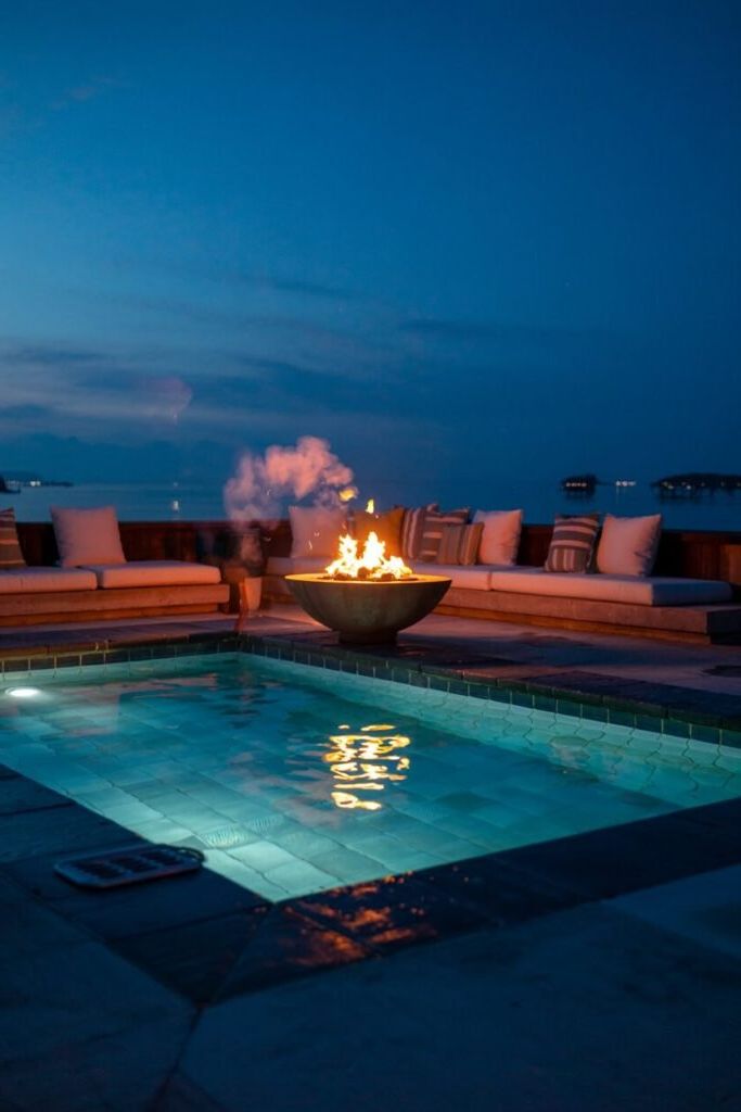 3. Poolside Fire Pit for Cozy Nights