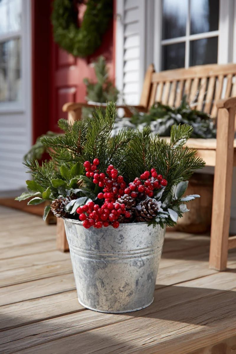 17. Outdoor galvanized bucket filled with pine and berries - photo 3