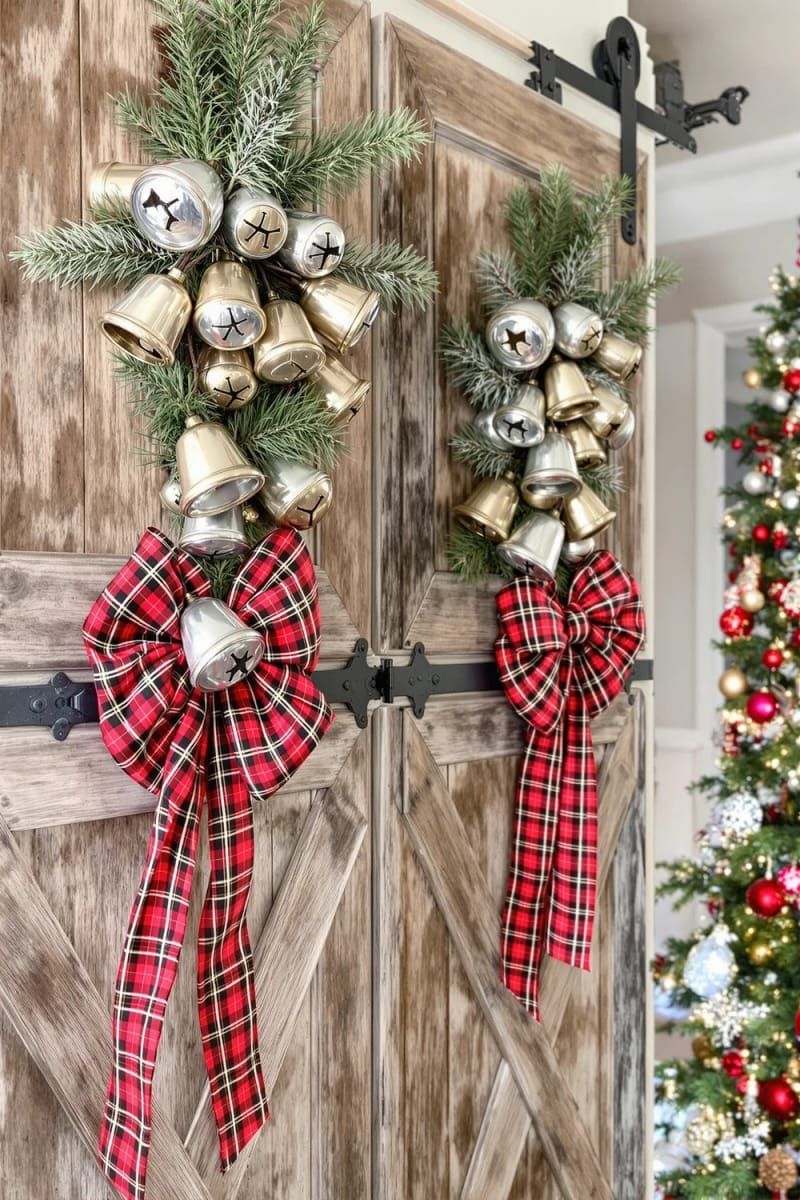 21. Barn door wall art with bells and plaid ribbon