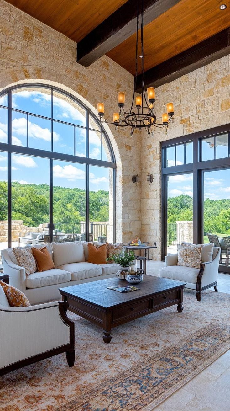 23. Grand Living Space With Stone Archways