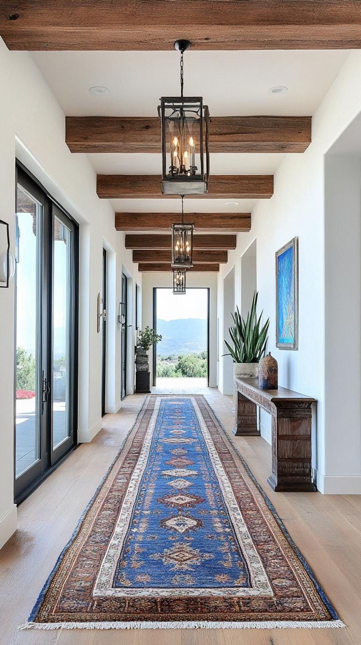 17. Hallway With Vintage Rugs and Exposed Beams - photo 3