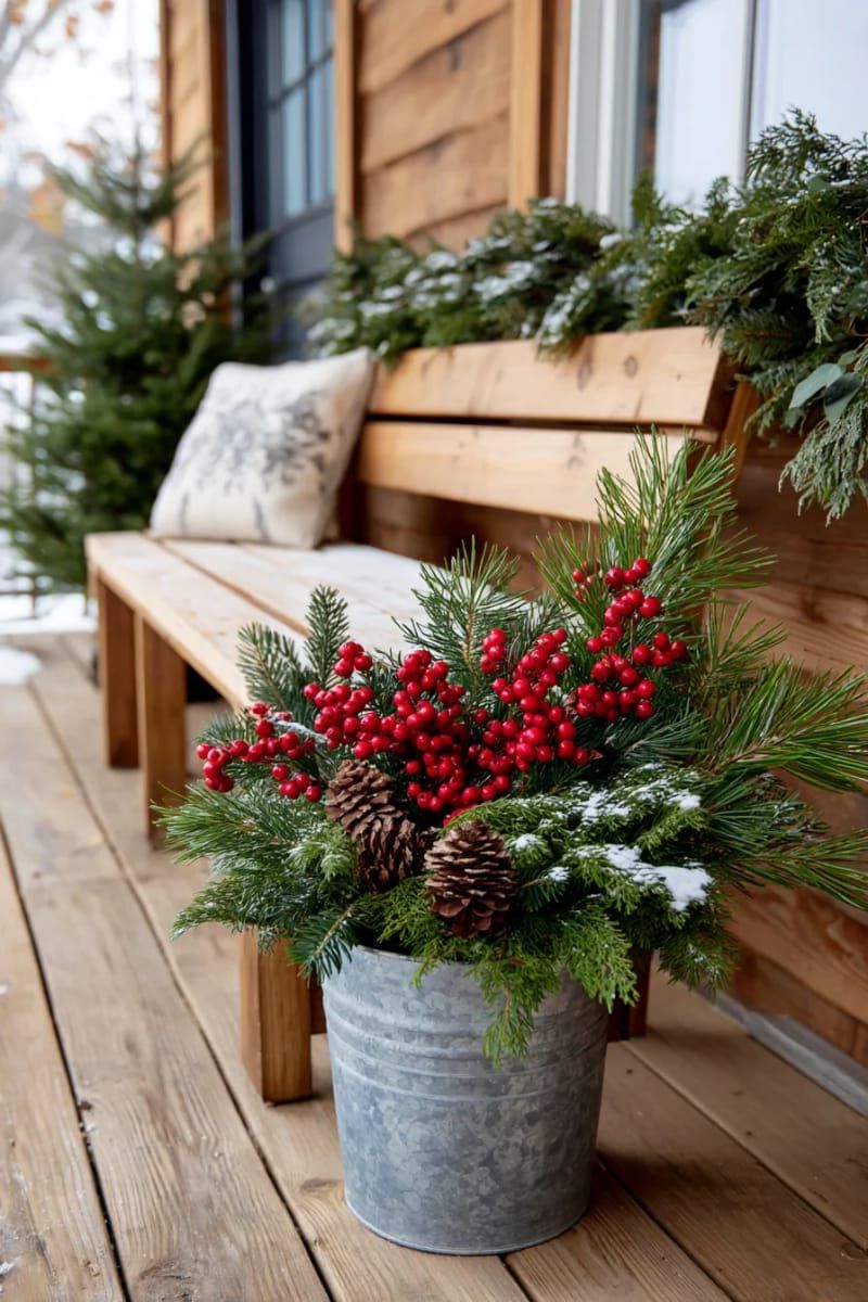 17. Outdoor galvanized bucket filled with pine and berries