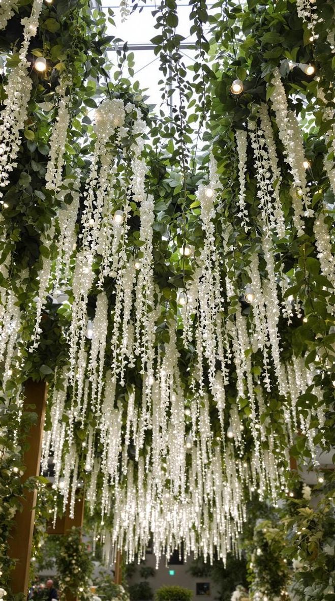 10. Greenery Ceiling Installation With Soft Lighting - photo 3