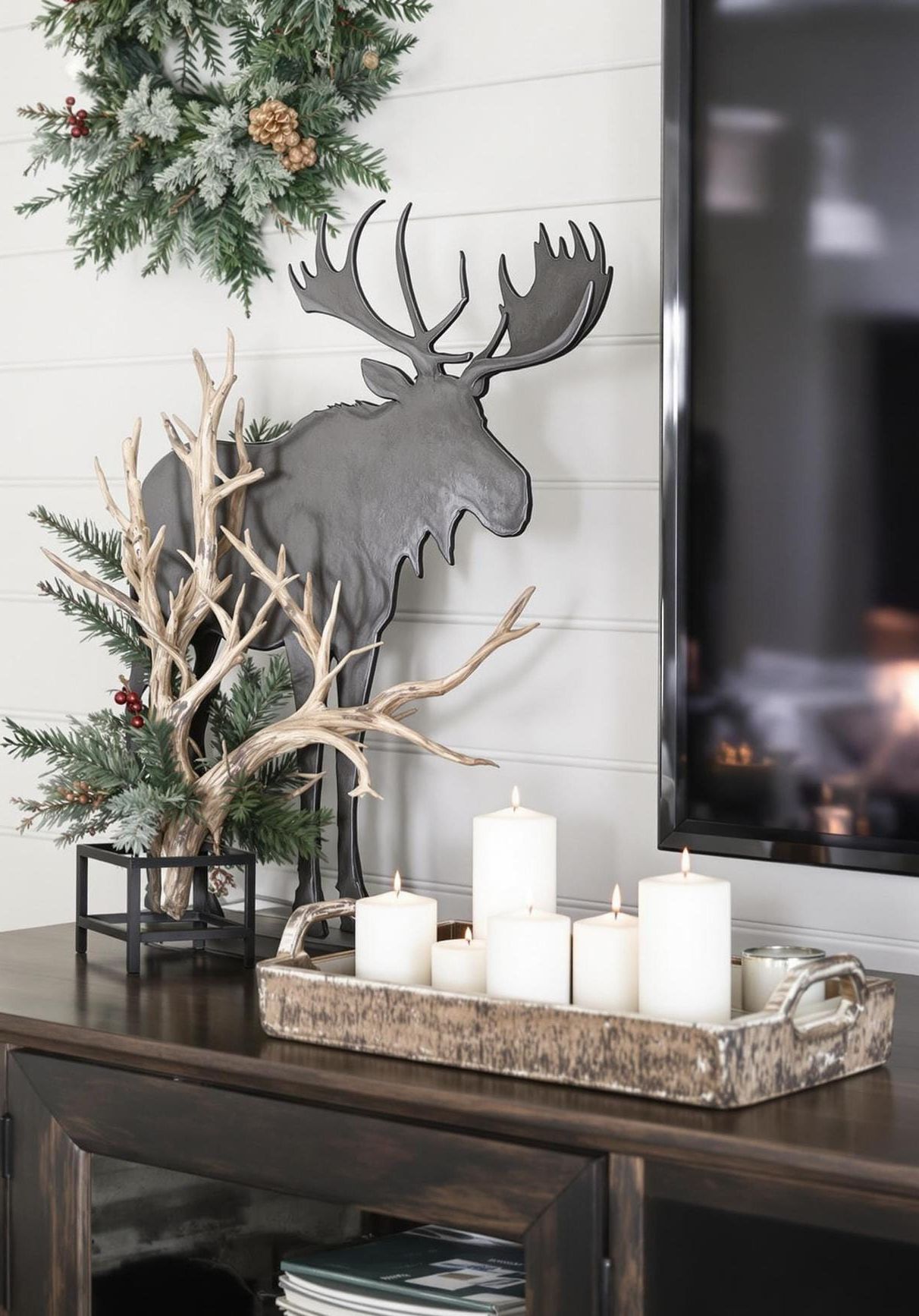 11. Rustic masculine TV stand with moose and antler accents - photo 2