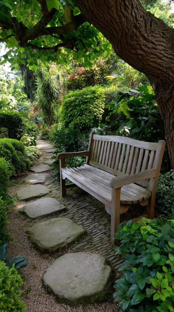 16. Garden bench tucked beside mossy stepping stones - photo 2