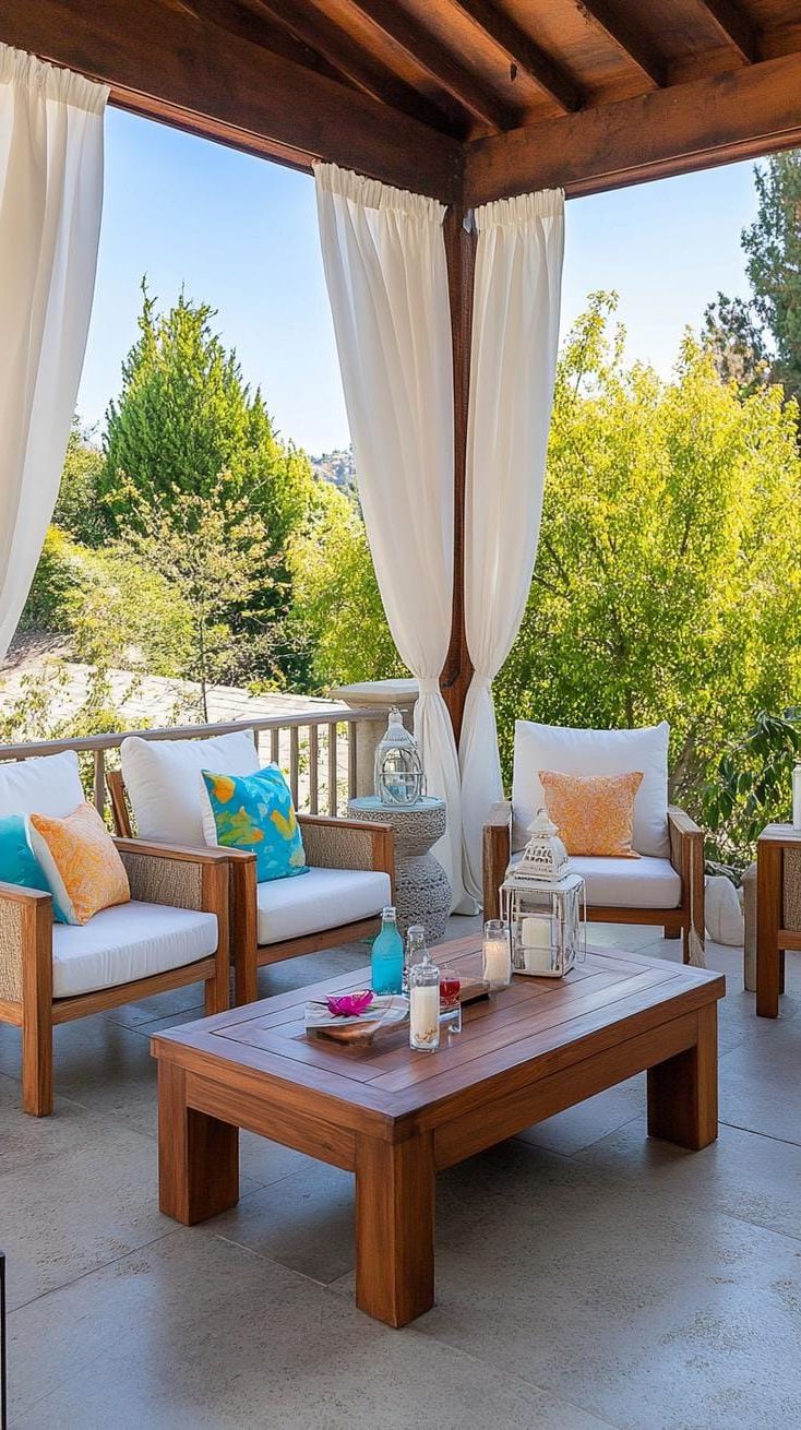 19. Canopy Patio with Flowing Sheer Curtains