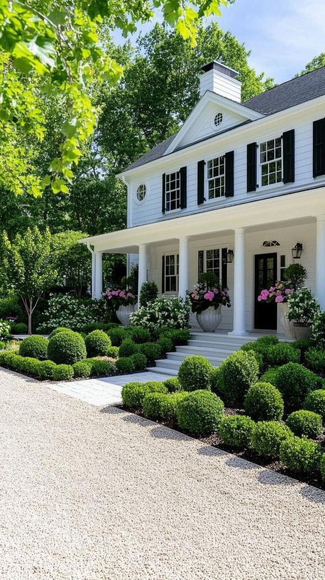 15. Minimalist Farmhouse Garden with Boxwood Shapes - photo 2
