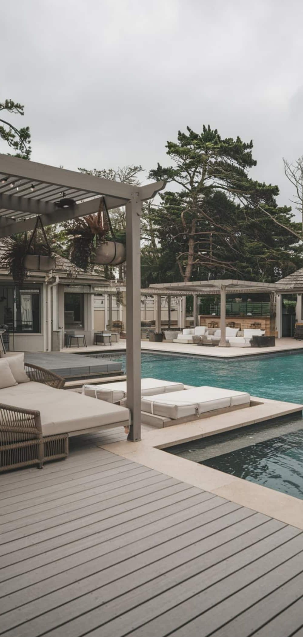 6. Resort-Style Canopy Daybeds for Poolside Lounging