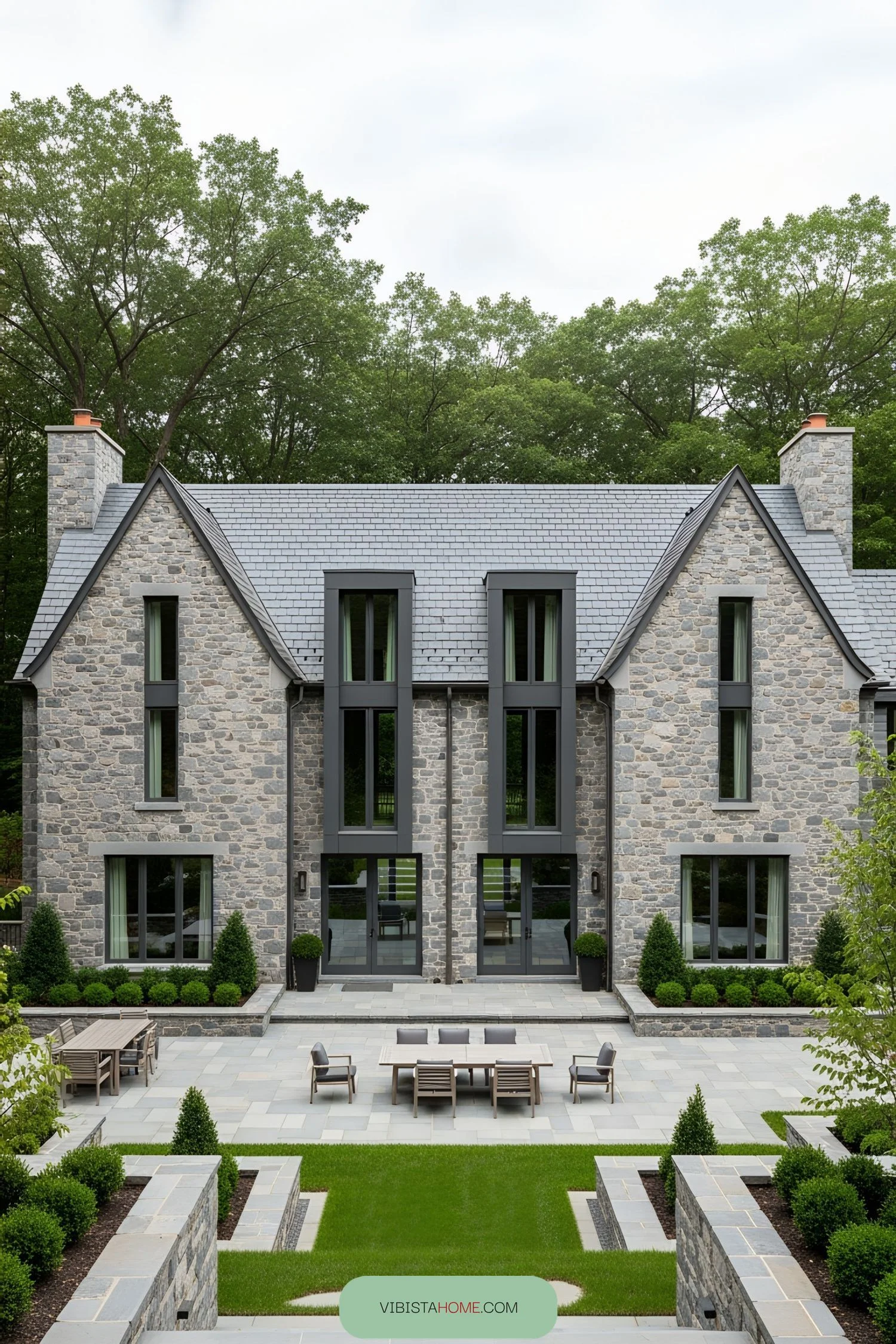 9) Stone Home With Landscaped Entrance