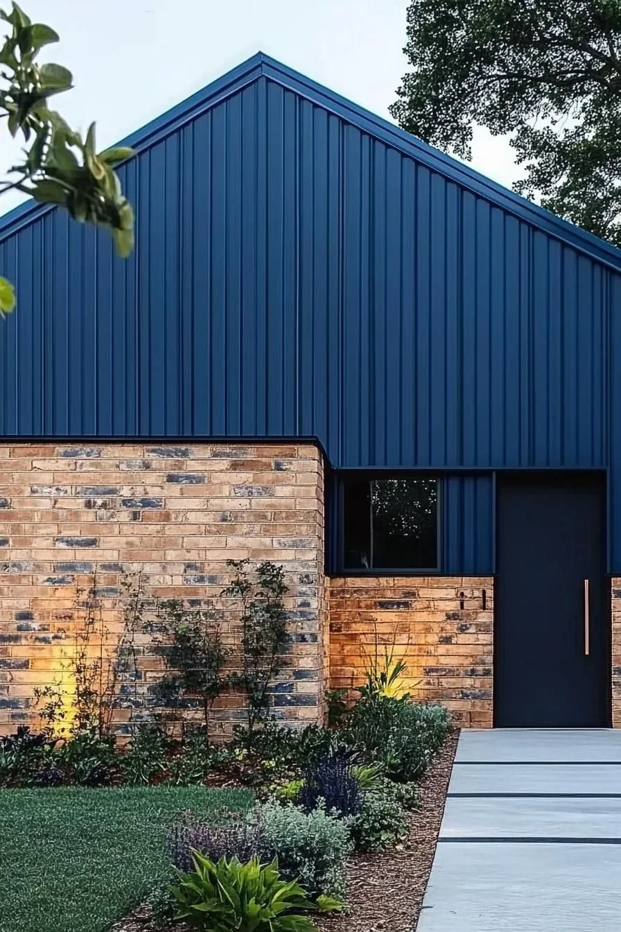 Brick Barn House With Blue Roof Peaks