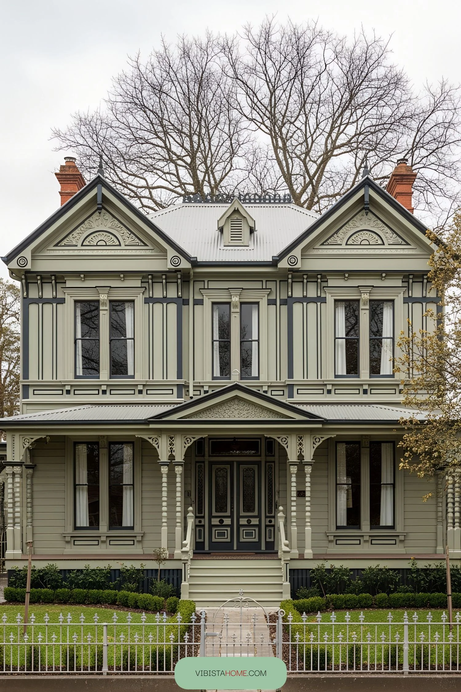 Victorian Charm Surrounded by Bare Branches
