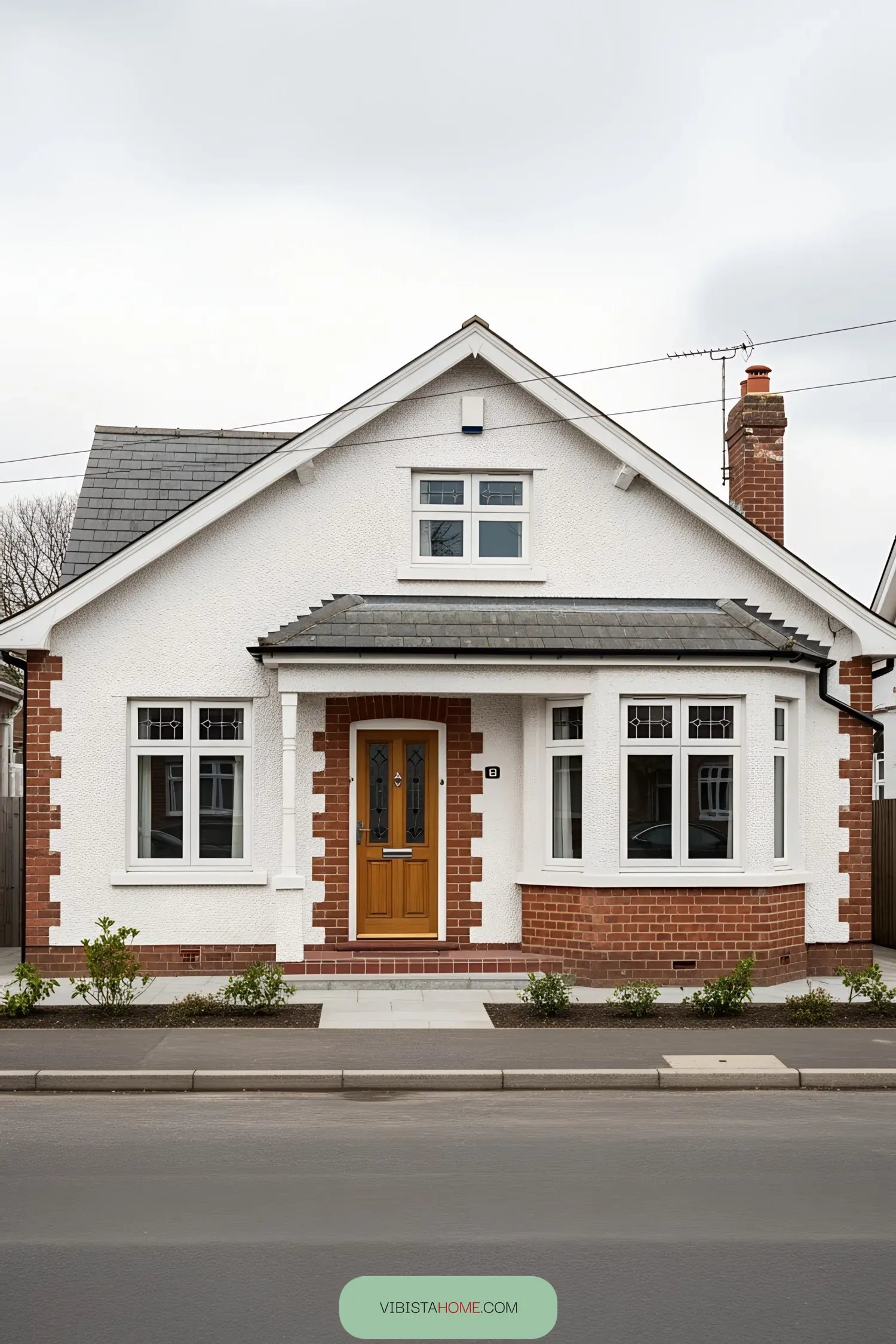 A Red Brick and White Stucco Bungalow