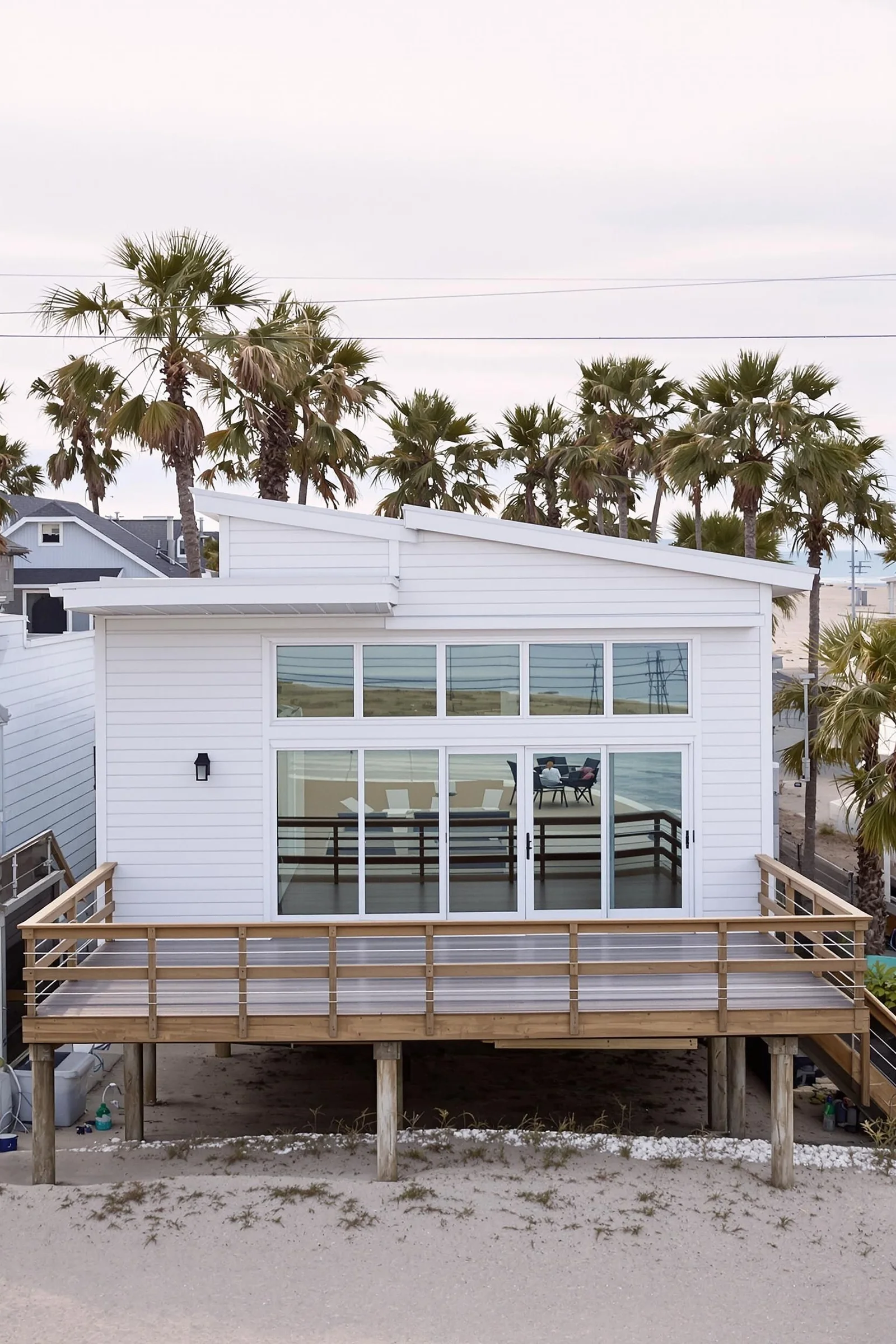 White Beach House Facing the Waves
